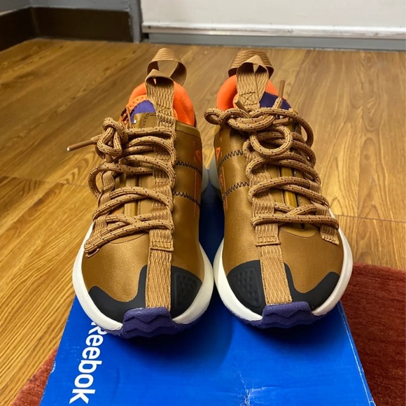 reebok running sole fury trainers in grey and orange